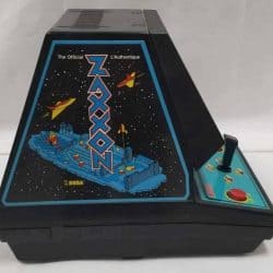 Side view of Zaxxon featuring the logo and a platform floating in space.