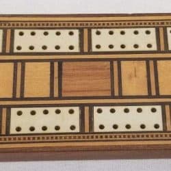 Wooden cribbage board from the 1880s.