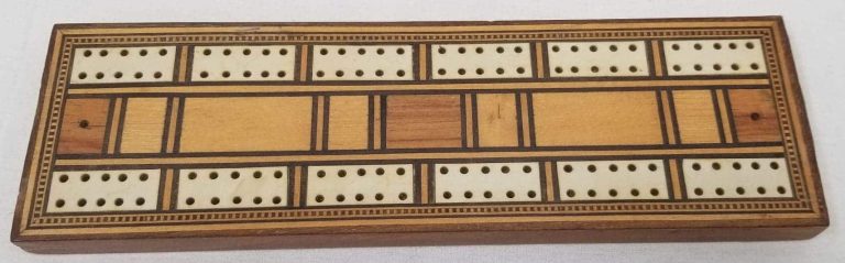 Wooden cribbage board from the 1880s.