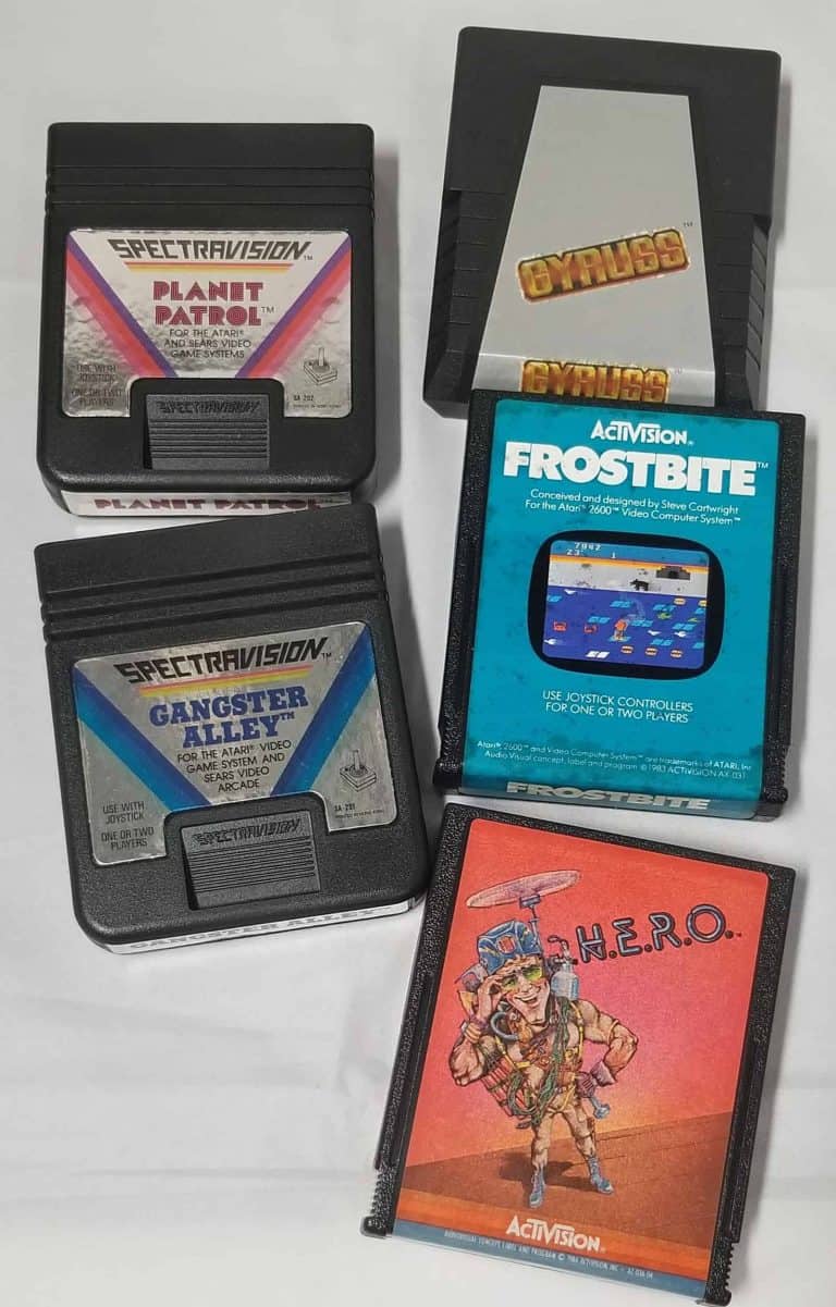 5 Atari Game Cartridges.