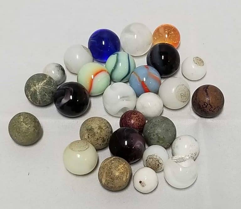 Variety of small glass marbles in all different colours.