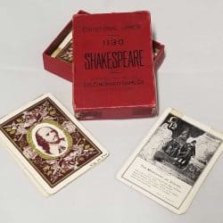 Red cardboard card box for Shakespeare, an educational game.