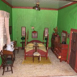 Bedroom with green walls.