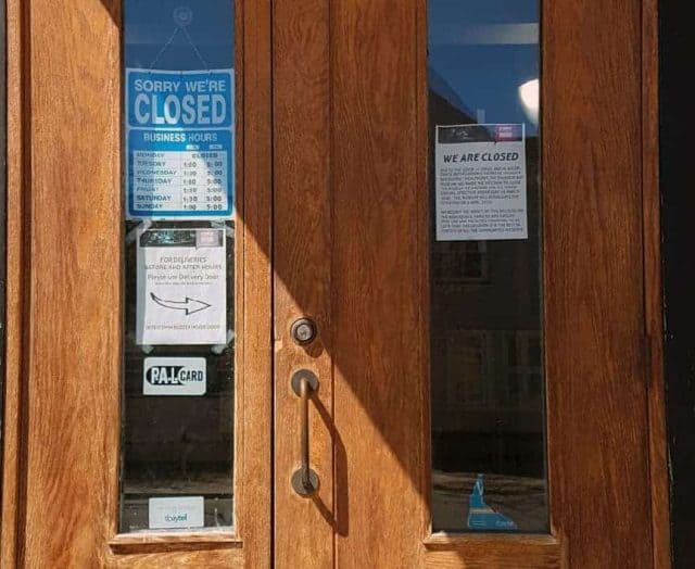 Sign on the Thunder Bay Museum doors saying We Are Closed.