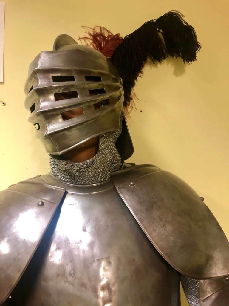 Closeup of the helmet on a suit of armour