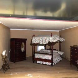 Dollhouse bedroom with a four poster bed