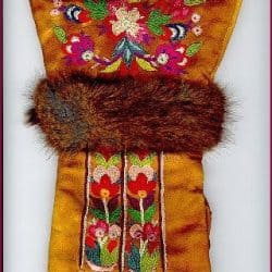 Embroidered deerskin glove edged with muskrat fur