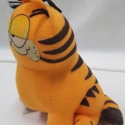 Stuffed orange cat with black stripes - Side View.