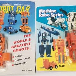 Orange robot toys that can transform, still in original packaging. The one on the left turns into a bulldozer, and the one on the right turns into a forklift.