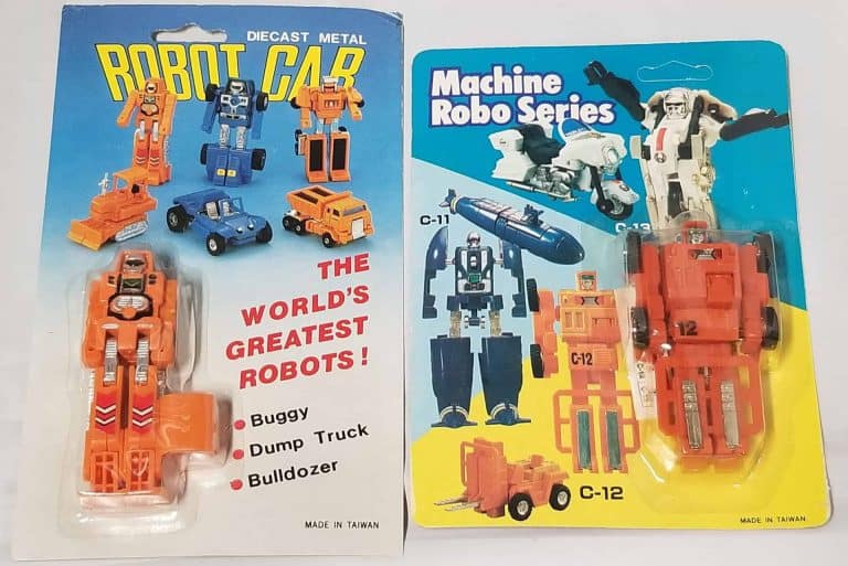 Orange robot toys that can transform, still in original packaging. The one on the left turns into a bulldozer, and the one on the right turns into a forklift.