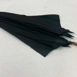 Black umbrella with a curved metal handle
